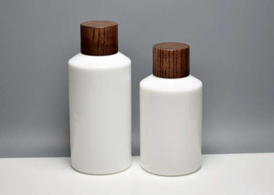 China BG-106X(2), 100ml 150ml opal white glass bottle with wooden screw cap, luxury glass primary skin care packaging supply supplier
