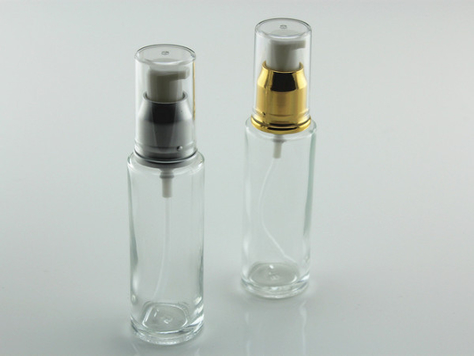 China Classic Sustainable Full-Capacity Cylinder Glass Cosmetic Bottle Container With Plastic Lotion Pump For CBD Oil Serum supplier