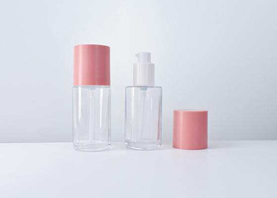 China Empty High Quality Customized Skin Care Packaging Supplier 50ml Cylinder Glass Pump Bottle With Customized Colors supplier