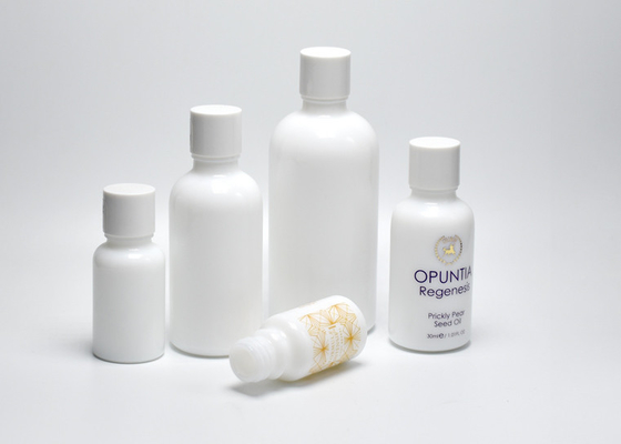 China Recyclable Porcelain Glass Bottles With Screw Bottle Cap, Opal Glass Packaging For Pharmacy Products And Essential Oil supplier