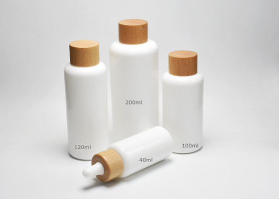 China Jade White 40, 100, 120ml Boston Round Opal Glass Bottles With Wooden-Plastic Clousures, Glass Primary Medical Packaging supplier