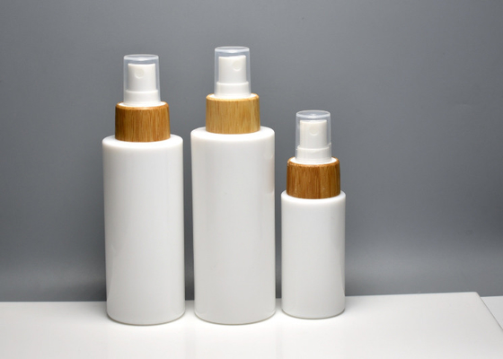 China 40ml 100ml 120ml Opaque White Glass Lotion Bottle With Bamboo Real Wood Mist Spray, Primary Fragrance Spray Bottles supplier